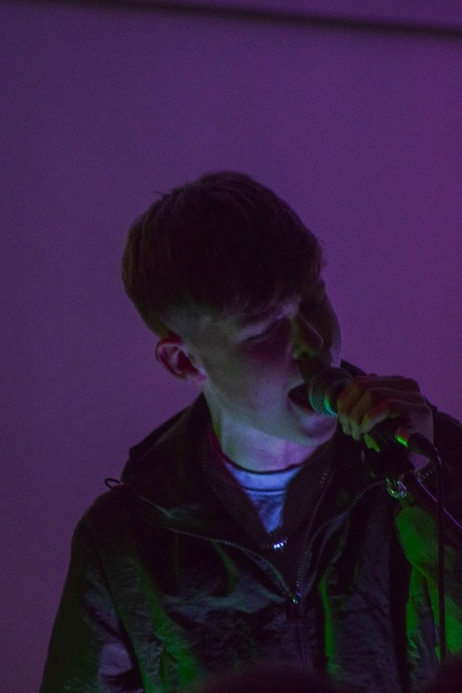 Max Thornhill singing into the mic